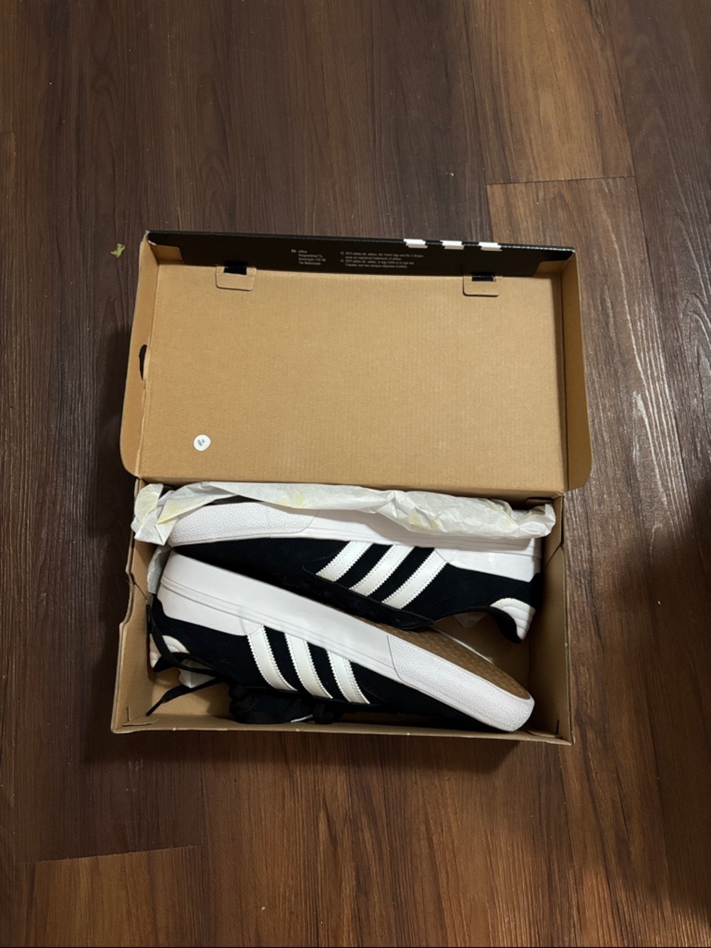 adidas Busenitz Black and White Low-Top Sneakers with Three Stripes